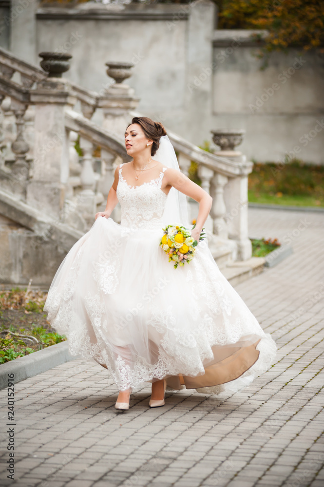 Beautiful bride with wedding bouquet