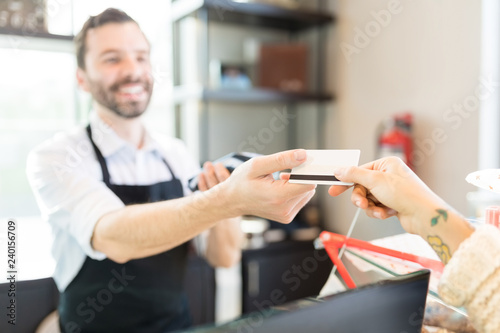 Baker Receiving Card Payment From Woman
