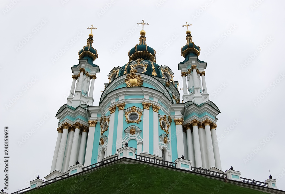 View of St. Andrew's Church on the background of a cloudy sky in Kiev..