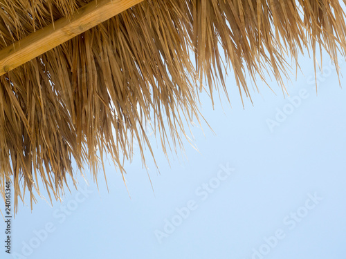 Sun-protecting umbrella on the beach