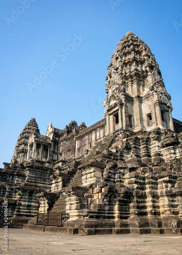 View of the main temple at Angkor wat. Originally constructed in the early 12th century, the ruins are a huge tourist attraction as well as a place of worship today