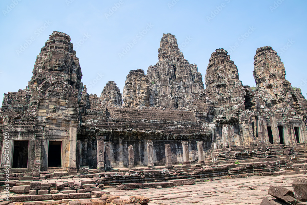 Bayon is remarkable for the 216 serene and smiling stone faces on the many towers jutting out from the high terrace and cluster around the central peak