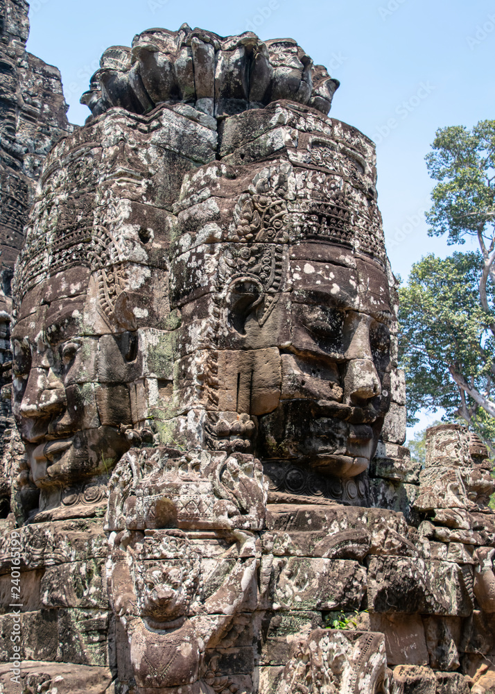 Bayon is remarkable for the 216 serene and smiling stone faces on the many towers jutting out from the high terrace and cluster around the central peak