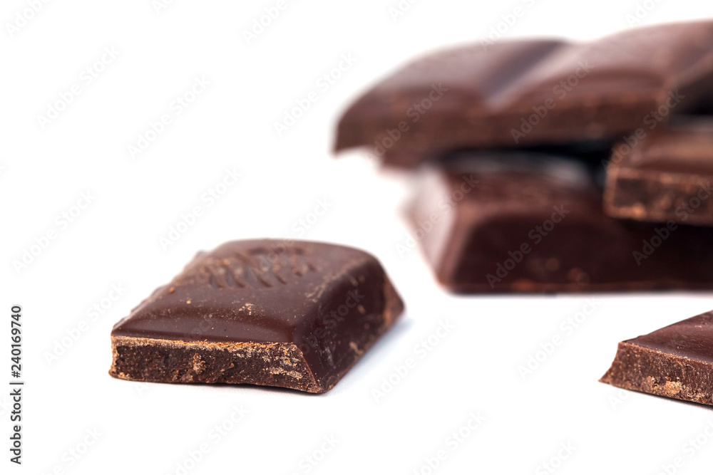 Dark Chocolate bars stack isolated on white background Dark Chocolate bars stack isolated on white background
