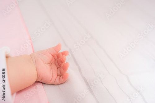 Little Hand Of Seeping Caucasian Baby Newborn Close Up.