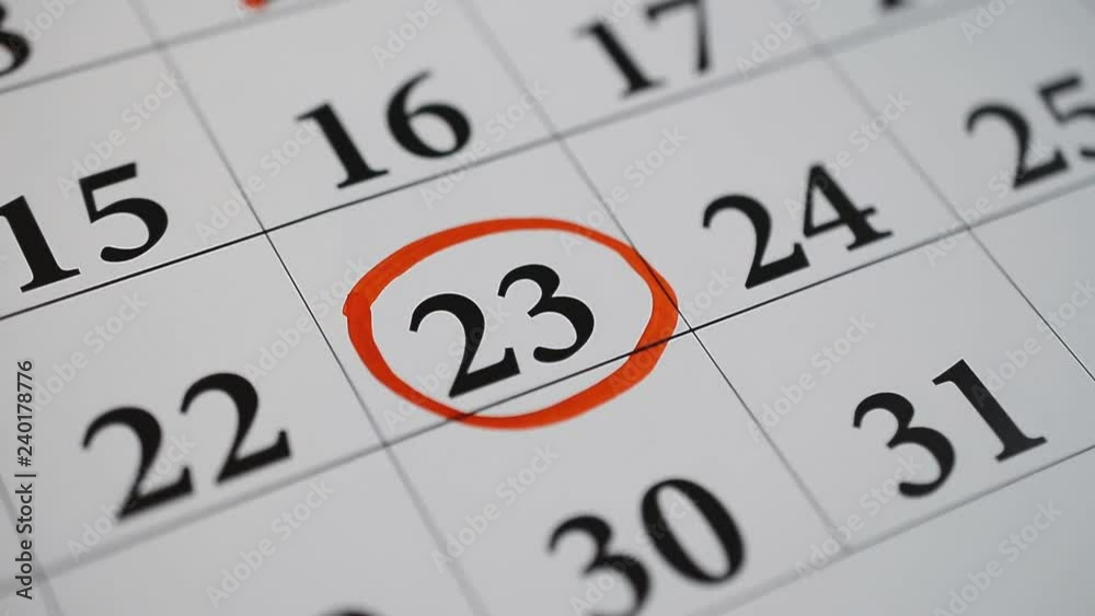 Signing a day on a calendar by red pen twenty third number hd footage Signing a day on a calendar by red pen twenty third number hd footage