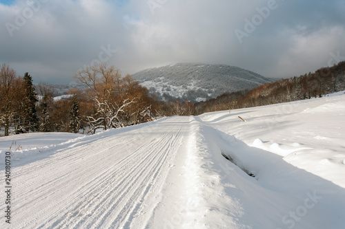 Snowy road in Bieszczady, Bieszczady Mountains, Bieszczady National Park, Carpathians Mountains, Poland