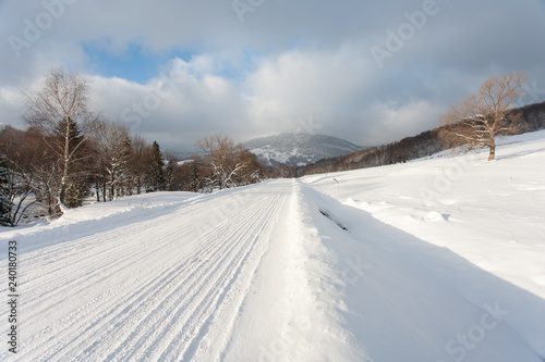 Snowy road in Bieszczady, Bieszczady Mountains, Bieszczady National Park, Carpathians Mountains, Poland © Maciej