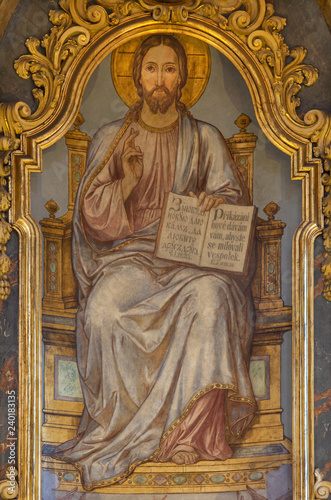 Fotografie PRAGUE, CZECH REPUBLIC - OCTOBER 13, 2018: The painting of Jesus the Teacher on the main altar of church Kostel Svatého Mikuláše on the Staroměstské square (begin of 20