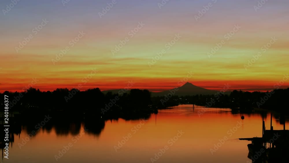 UHD 4K time lapse video of Sunrise with Mt.Hood along Willamette river from dark to orange sky with water reflection in Oregon 3840x2160 Ultra High Definition UHD 4K time lapse video of Sunrise with Mt.Hood along Willamette river from dark to orange sky with water reflection in Oregon 3840x2160 Ultra High Definition