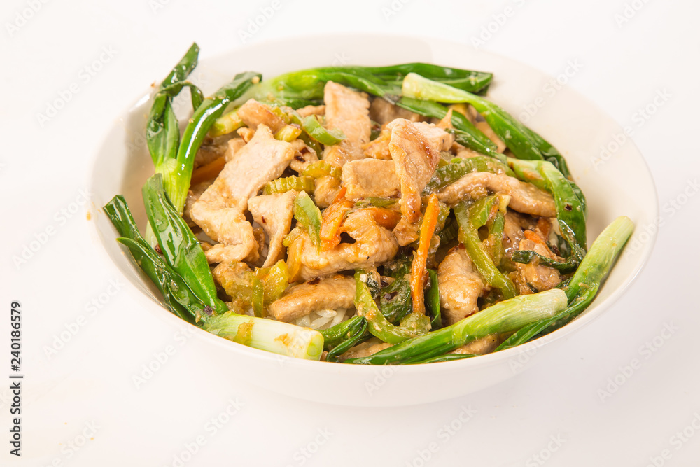 Pork Stir Fry over Steamed Rice against White BG