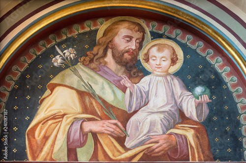 PRAGUE, CZECH REPUBLIC - OCTOBER 17, 2018: The fresco of St. Joseph in church kostel Svatého Cyrila Metodeje by brothers Carl and Franz Jobst (sc. half of 19. cent.).