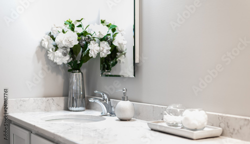 White Bathroom with white flowers