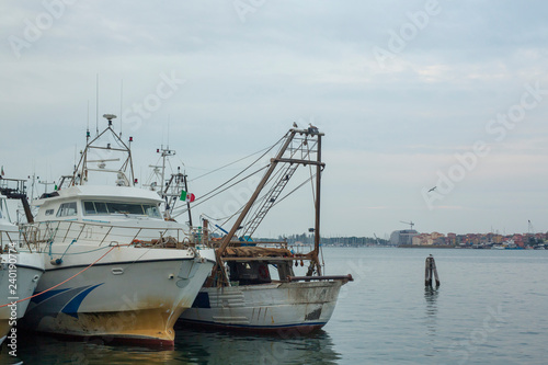 Chioggio, Italy: fishing boats in harbor © TaisyaKuzmenko