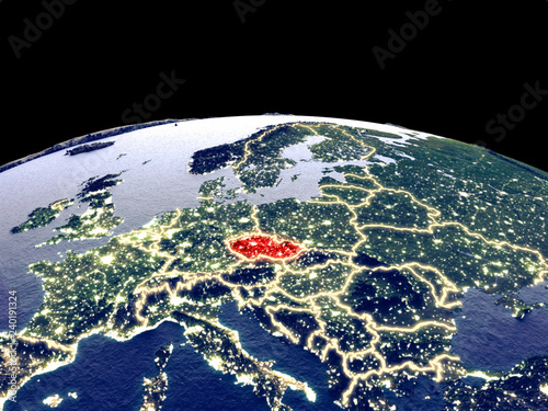 Czech republic from space on planet Earth at night with bright city lights. Detailed plastic planet surface with real mountains.