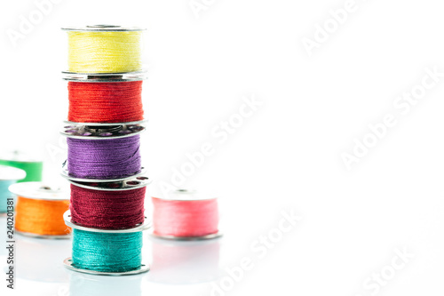 colored yarns on spools
