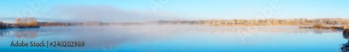 Panorama Morning fog on the lake in the frosty morning