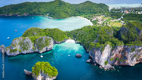 hi season boat and tourists on phiphi island Krabi Thailand aerial view from drone