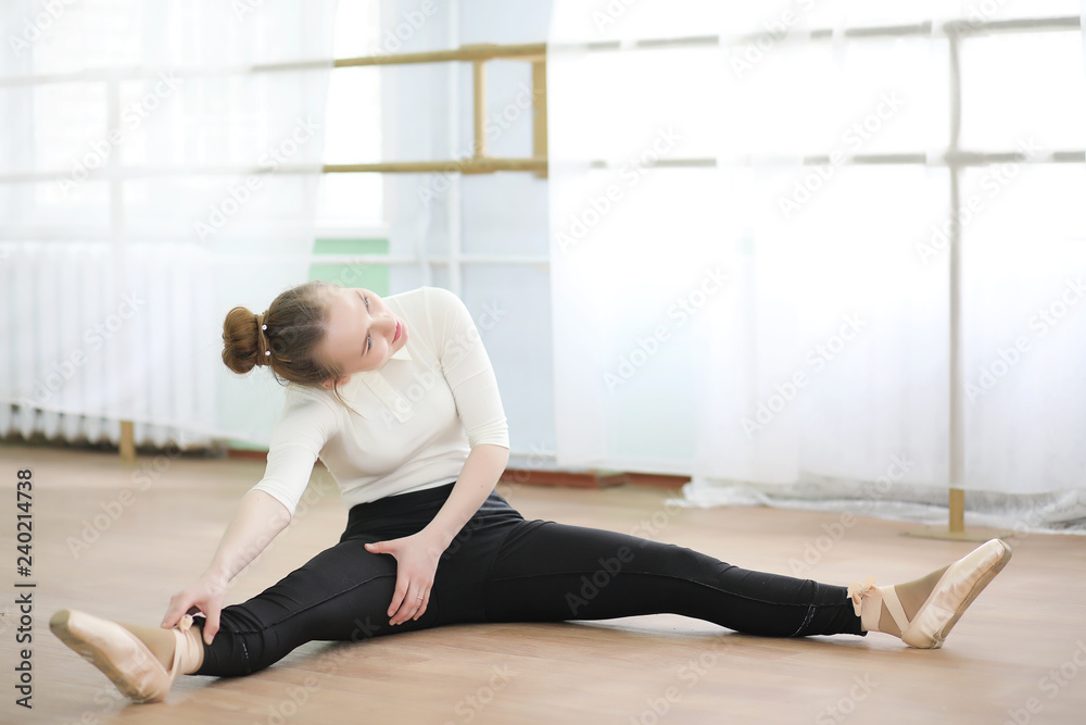 Pretty girl ballet dancer practicing