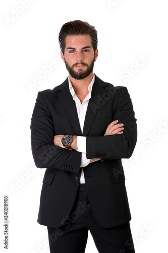 Shot of handsome elegant young man with suit and neck-tie, isolated on white, looking at camera