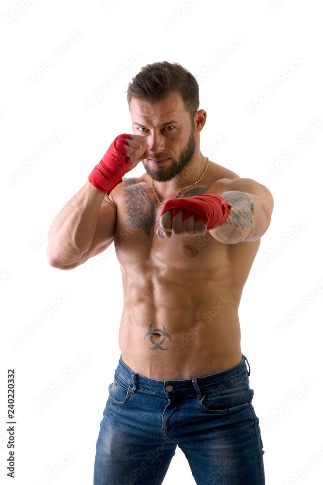 Muscular man in red gloves for MMA, mixed martial arts,