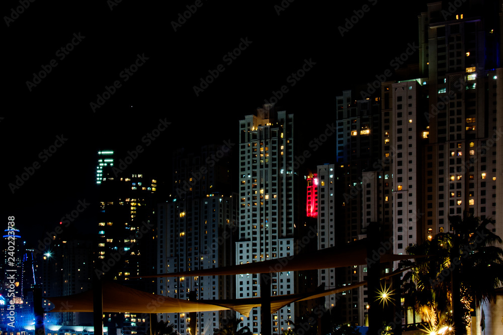 Dubai, United Arab Emirates - November 19, 2018: JBR, Jumeirah Beach Resort seafront at night.
