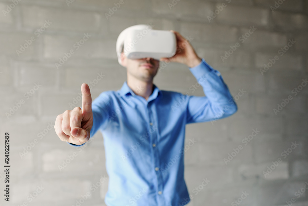 Builder projecting with VR glasses future interior standing at the construction site Builder projecting with VR glasses future interior standing at the construction site