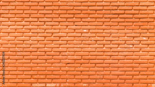 orange wall background.