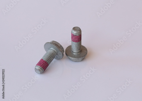 Screws with threadlocker