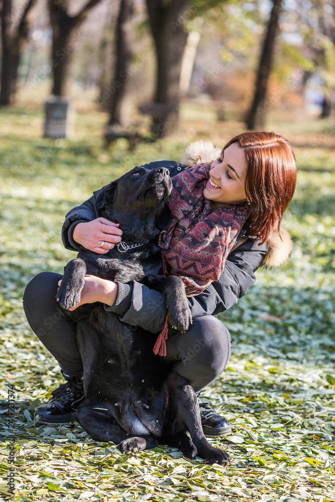 Lovely girl playing with dogs outdoor Lovely girl playing with dogs outdoor