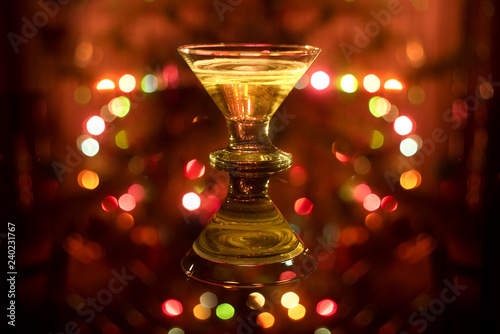 Christmas champagne glass on a red background