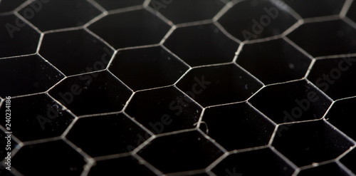 honeycomb pattern on the black rubber mats © maykal