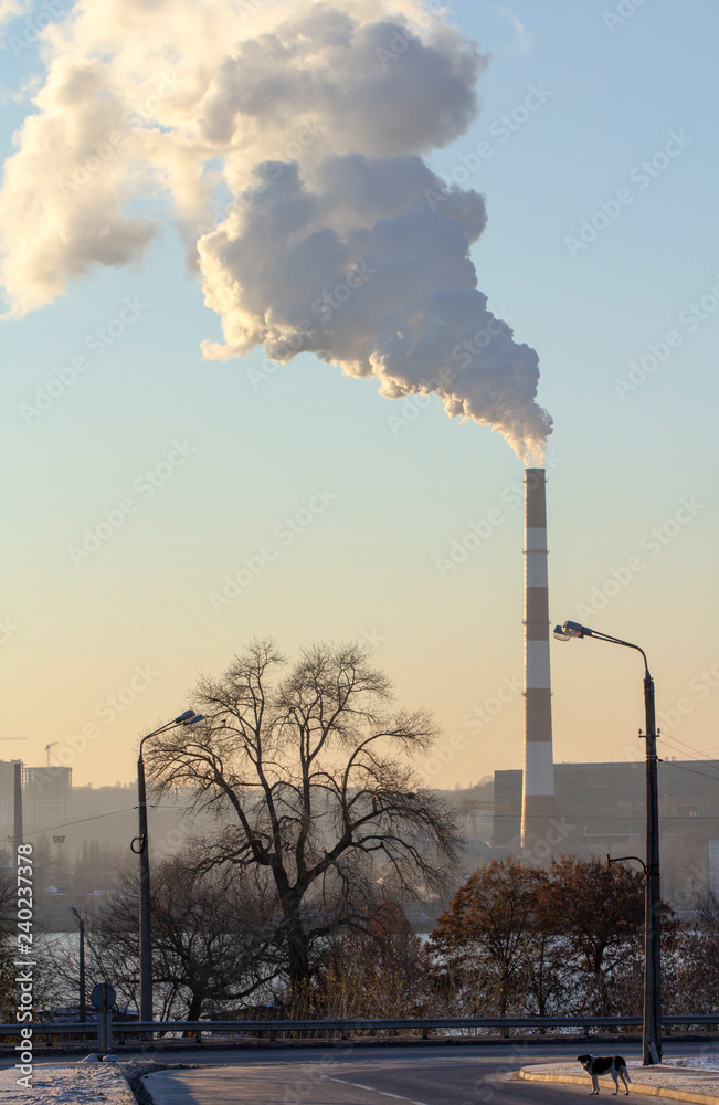 Smoke from industrial chimneys against the blue sky. Pollution. Smoke from industrial chimneys against the blue sky. Pollution.