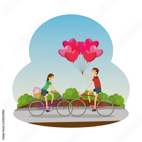 couple in bicycle traveling on the road
