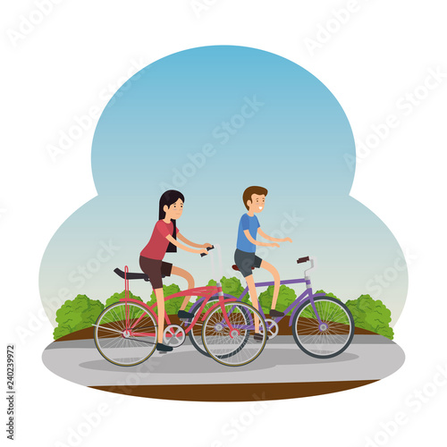 couple in bicycle traveling on the road