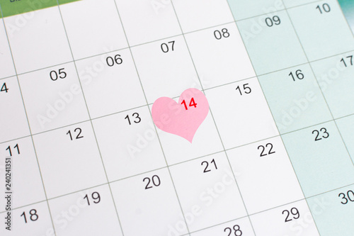 Calendar with heart decoration. St Valentine's day. Holiday concept.