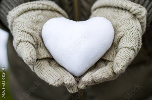 Snow heart in hand