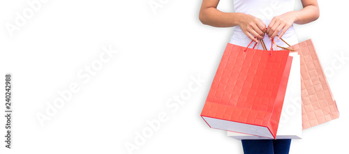 Women are using paper bags to shop.