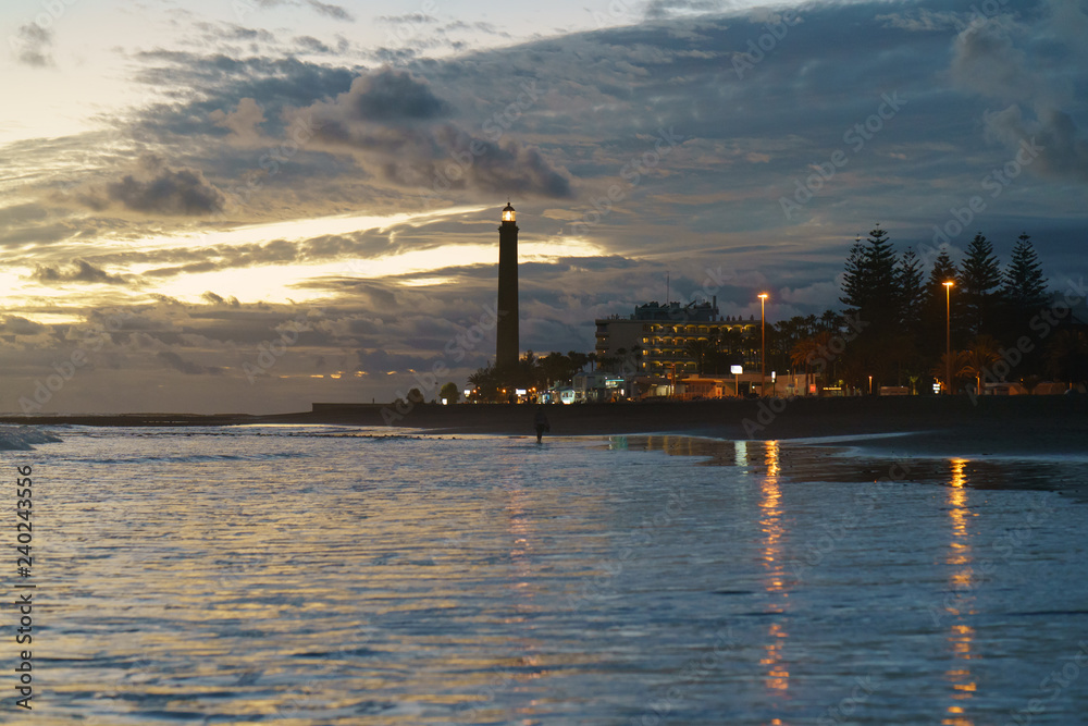 Lighthouse in Maspalomas of Grand Canaria island at sunset