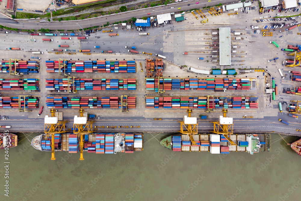 Flying above colorful pattern of Logistics and transportation in Laem Chabang International Terminal thailand / Aerial view of Container Cargo ship - Commercial port and Cargo import/export - obrazy, fototapety, plakaty 