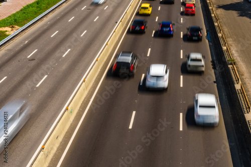 Abstract and blurred background of the many cars in street. Blurred motion
