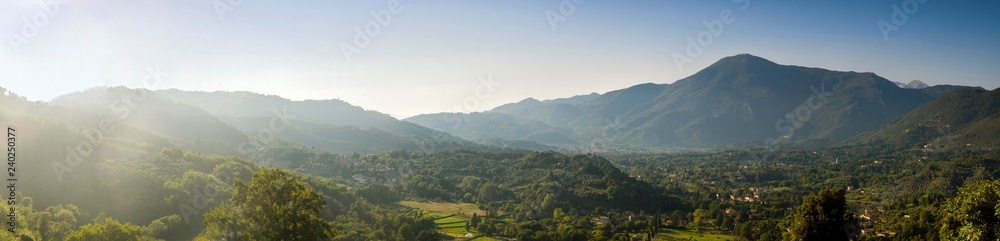 A valley in Tuscany with mountains in the background, Tuscany, Italy