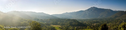 A valley in Tuscany with mountains in the background  Tuscany  Italy