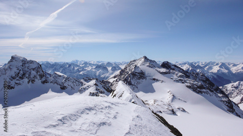 winter mountain landscape in the Silvretta mountain range in the Swiss Alps between Scuol and Ischgl on a beautiful winter day