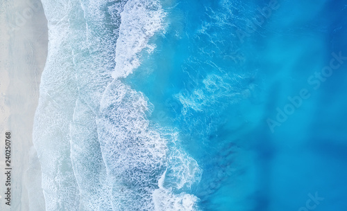 Beach and waves from top view. Turquoise water background from top view. Summer seascape from air. Top view from drone. Travel concept and idea © biletskiyevgeniy.com