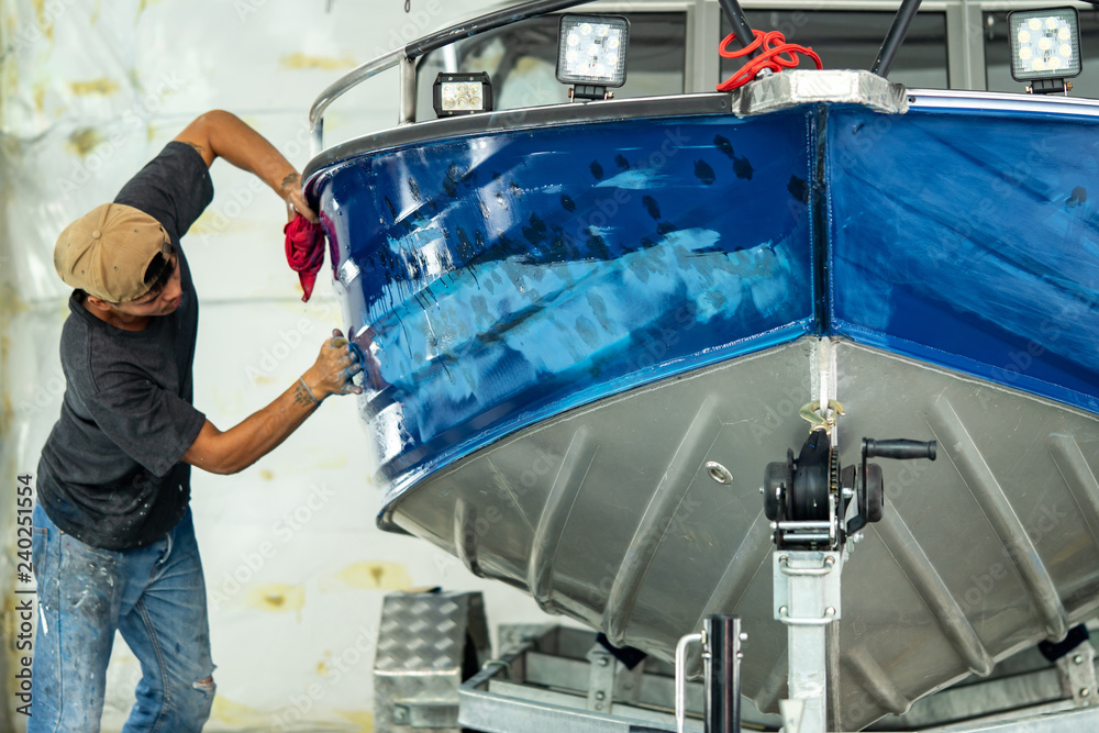 Aluminum boat painting procedure at service center StockFoto Adobe Stock