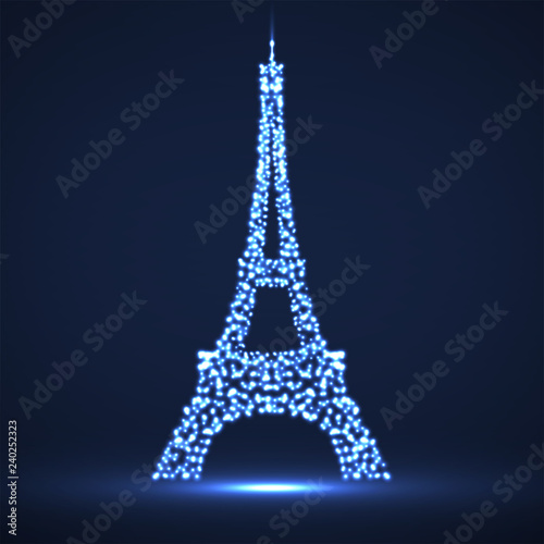 Fototapeta Naklejka Na Ścianę i Meble -  Abstract Eiffel Tower of glowing particles. Vector