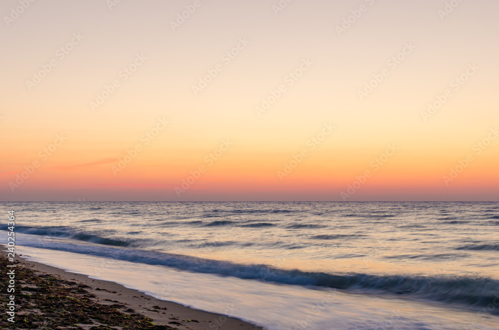 Beautiful sunrise or sunset on the sea beach