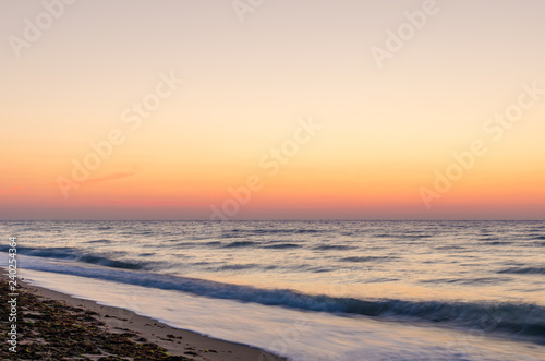 Beautiful sunrise or sunset on the sea beach