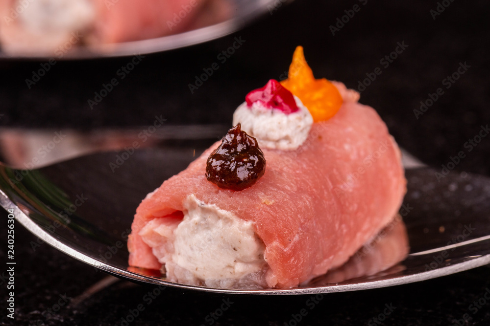A meat roll with berry, creamy and pumpkin mousse A meat roll with berry, creamy and pumpkin mousse